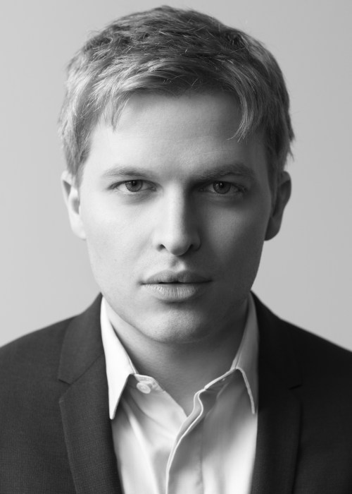 Black and white headshot image of Ronan Farrow