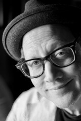 black and white photo of author and comedian Rob Schneider